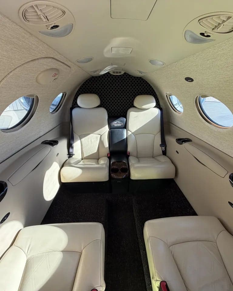A view of the Citation Mustang cabin, showing the seating arrangement and interior details.