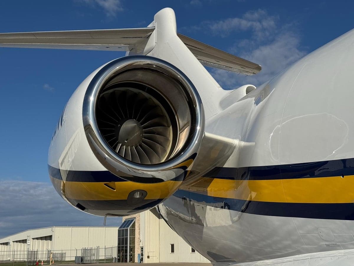 Close up of the engine and tail of the aircraft.