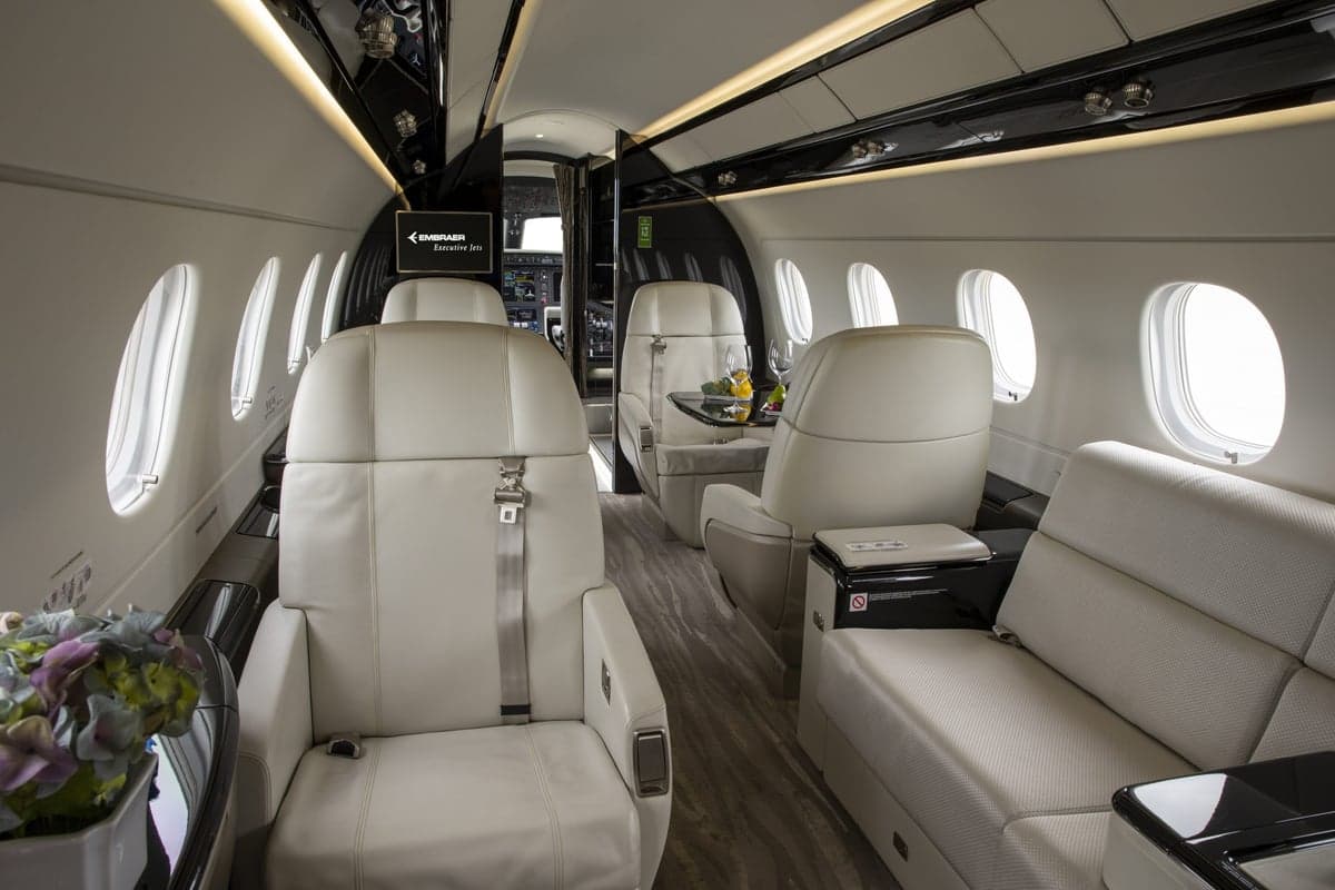 Interior view of the Embraer Legacy 500 cabin looking towards the cockpit.