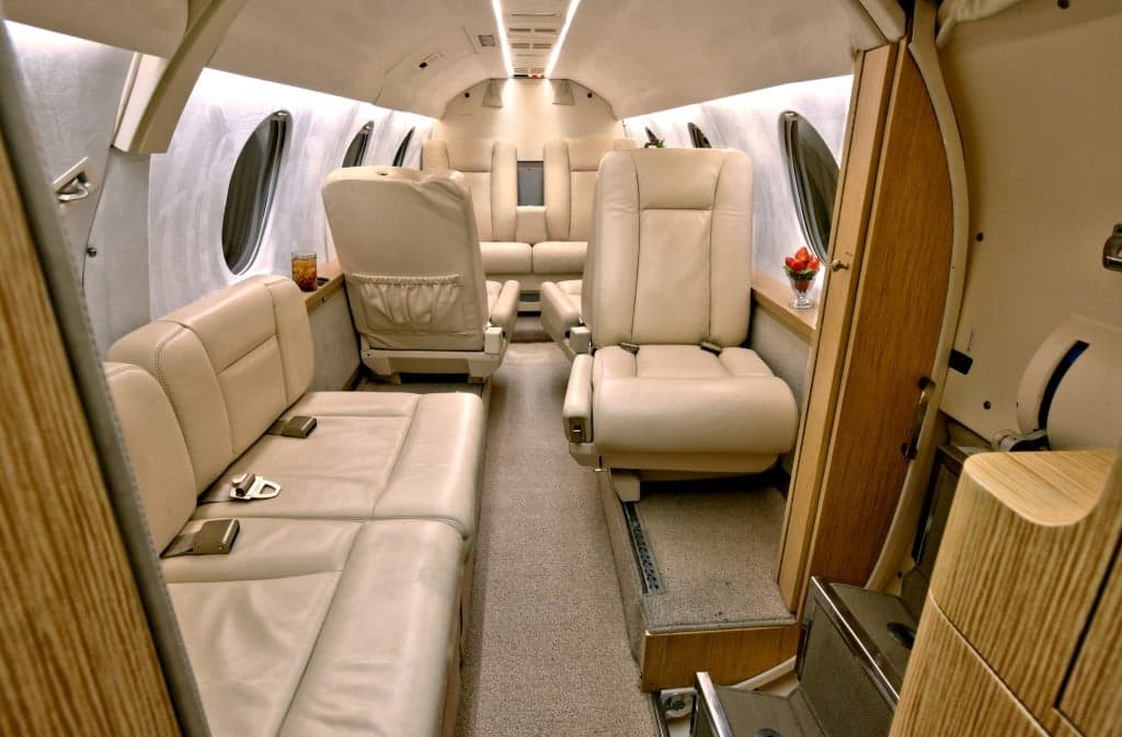 Wide view of the Hawker 4000 cabin showing the seating arrangement and interior details.