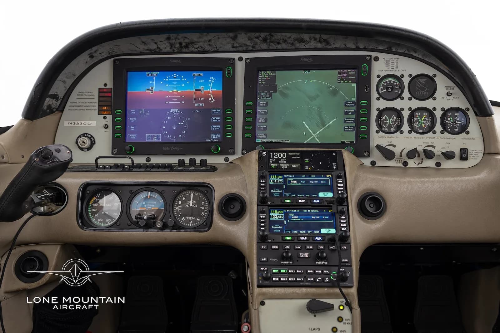 The instrument panel of a Cirrus SR22 aircraft, featuring two large digital displays and various gauges.