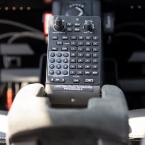 Close up of the center console controls in the cockpit of the aircraft.