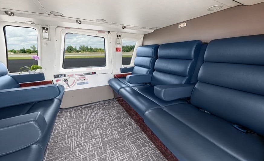View of the interior cabin with blue leather seats.