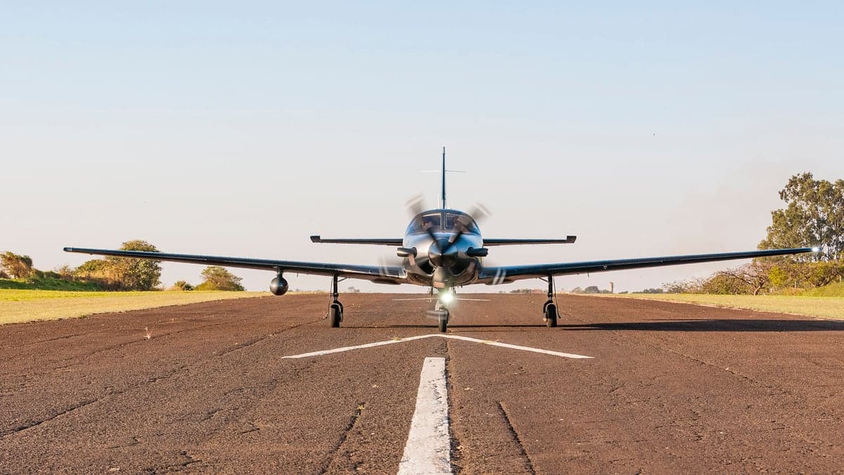 Piper M600 on the runway, facing forward.