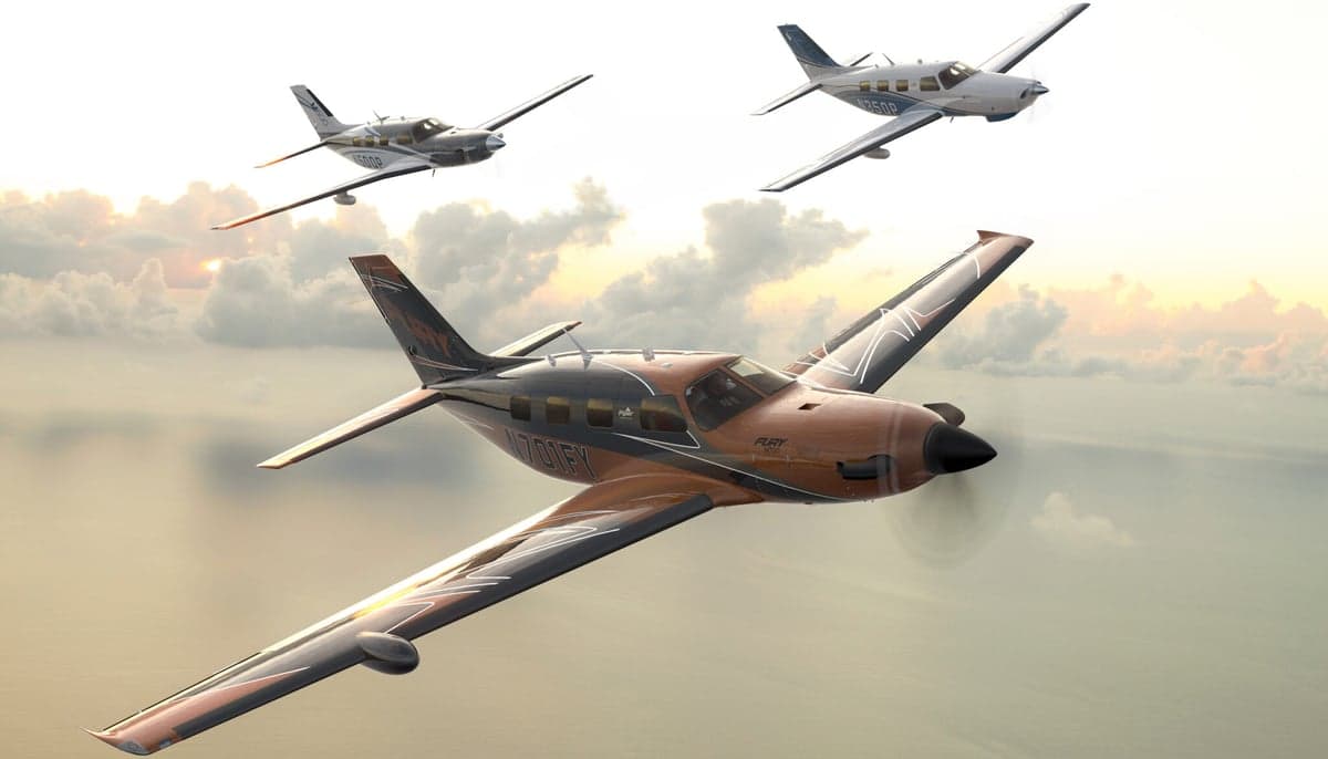 Three Fury aircraft flying in formation against a cloudy sky.