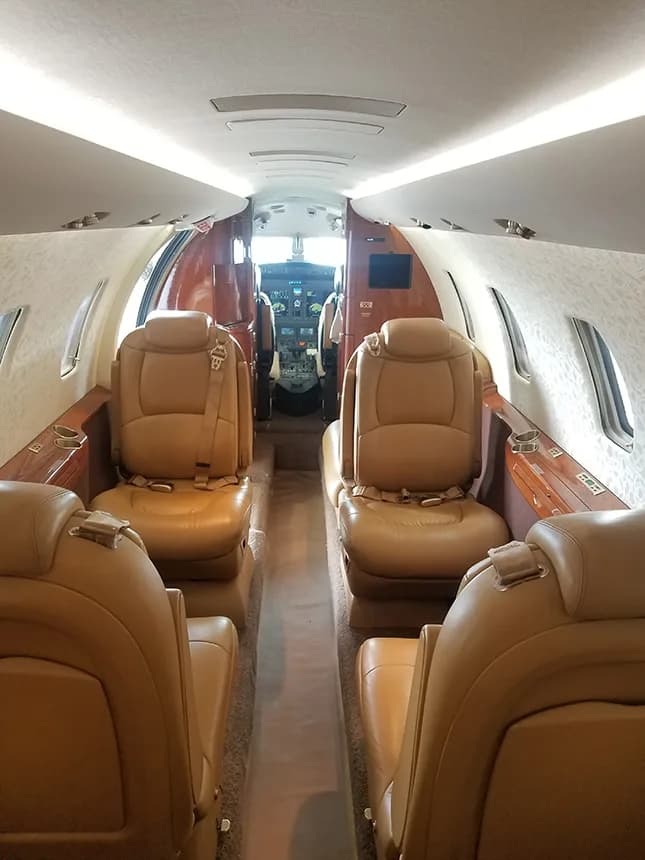 Interior view of the aircraft showing the cabin seats.