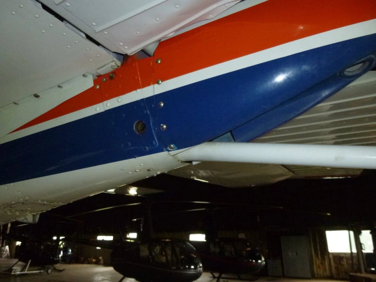 Close-up of the wing of a Cessna Skywagon 185.