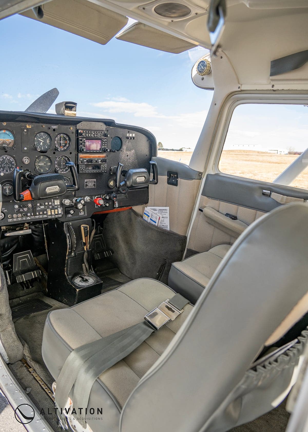 Close-up of the Cessna 172 Skyhawk cockpit controls and instruments.