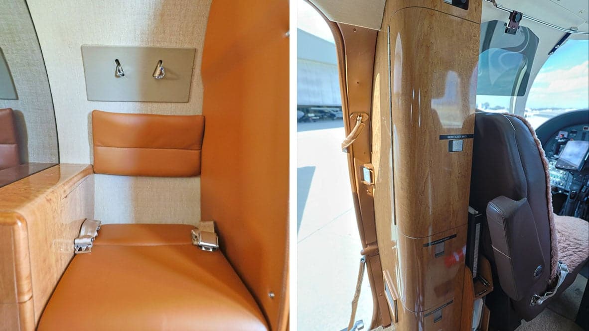 A close-up of the interior of a Cessna Citation CJ1 aircraft, showing the leather seats and wood trim.