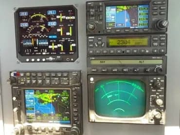 Various instruments and avionics in the cockpit of a Cessna 421C Golden Eagle aircraft.