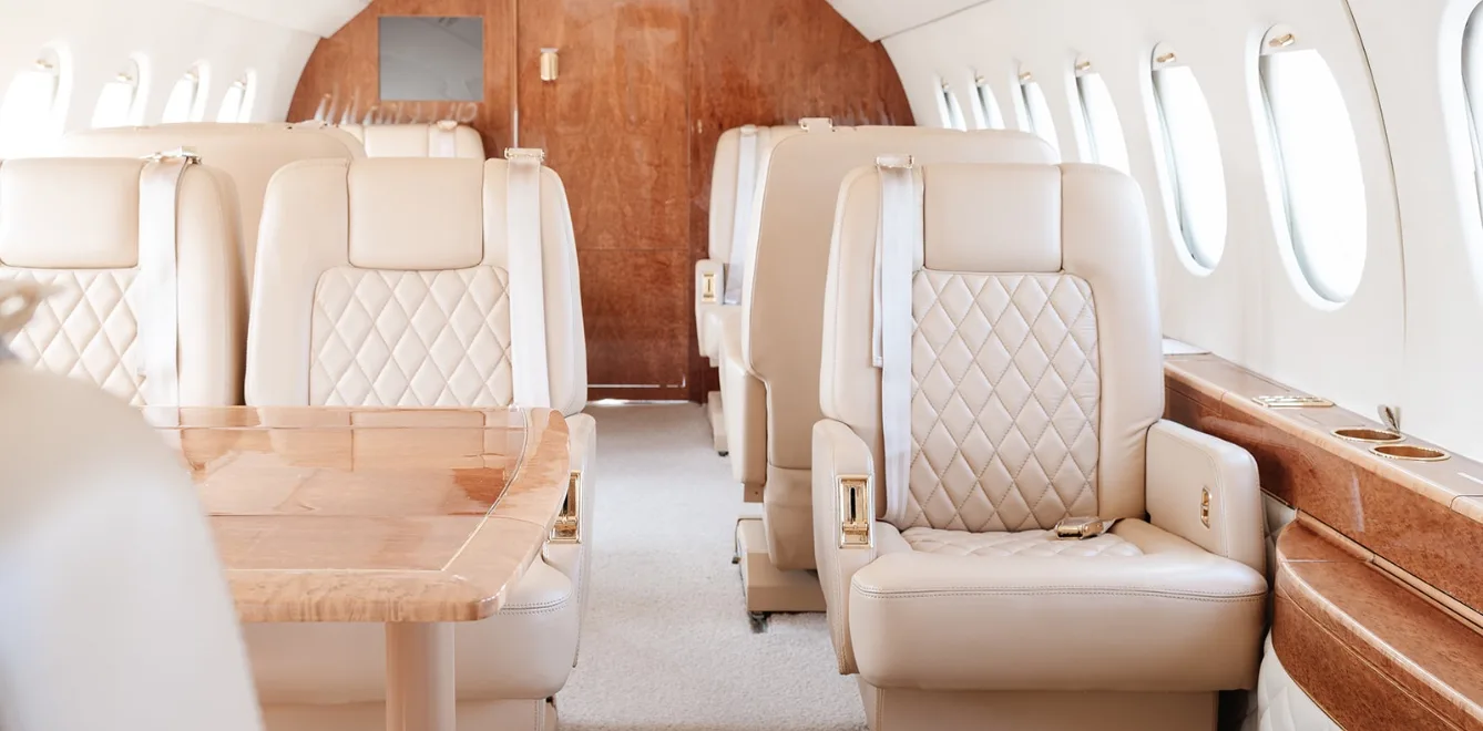 A view of the aircraft's interior, showing the seating arrangement and table.