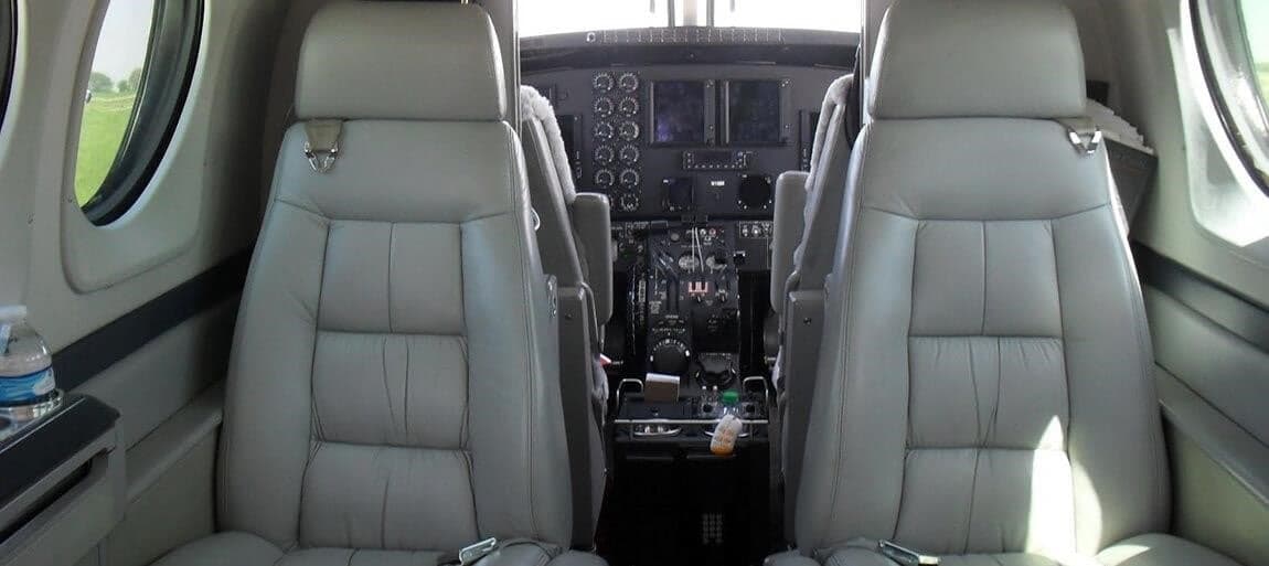 King Air cabin showing seats and cockpit.