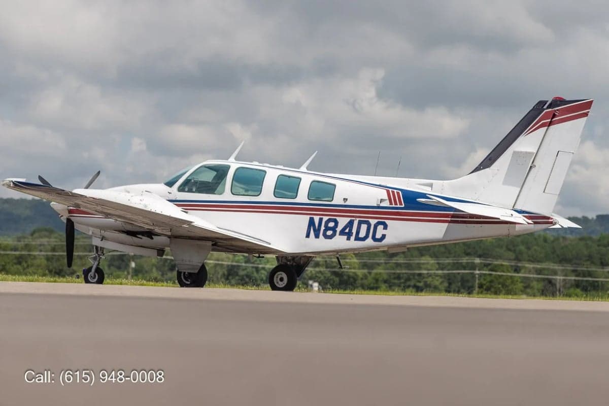 Side view of a Beechcraft Baron on the ramp.