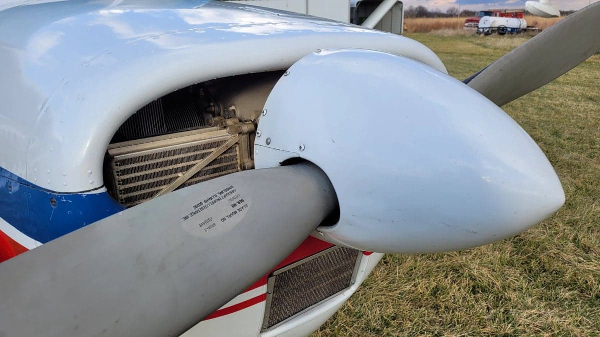 A close-up of the propeller and engine of the Cessna Skylane.