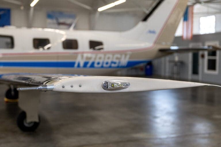 A close-up of the wingtip and N788SM tail number of the Malibu aircraft.