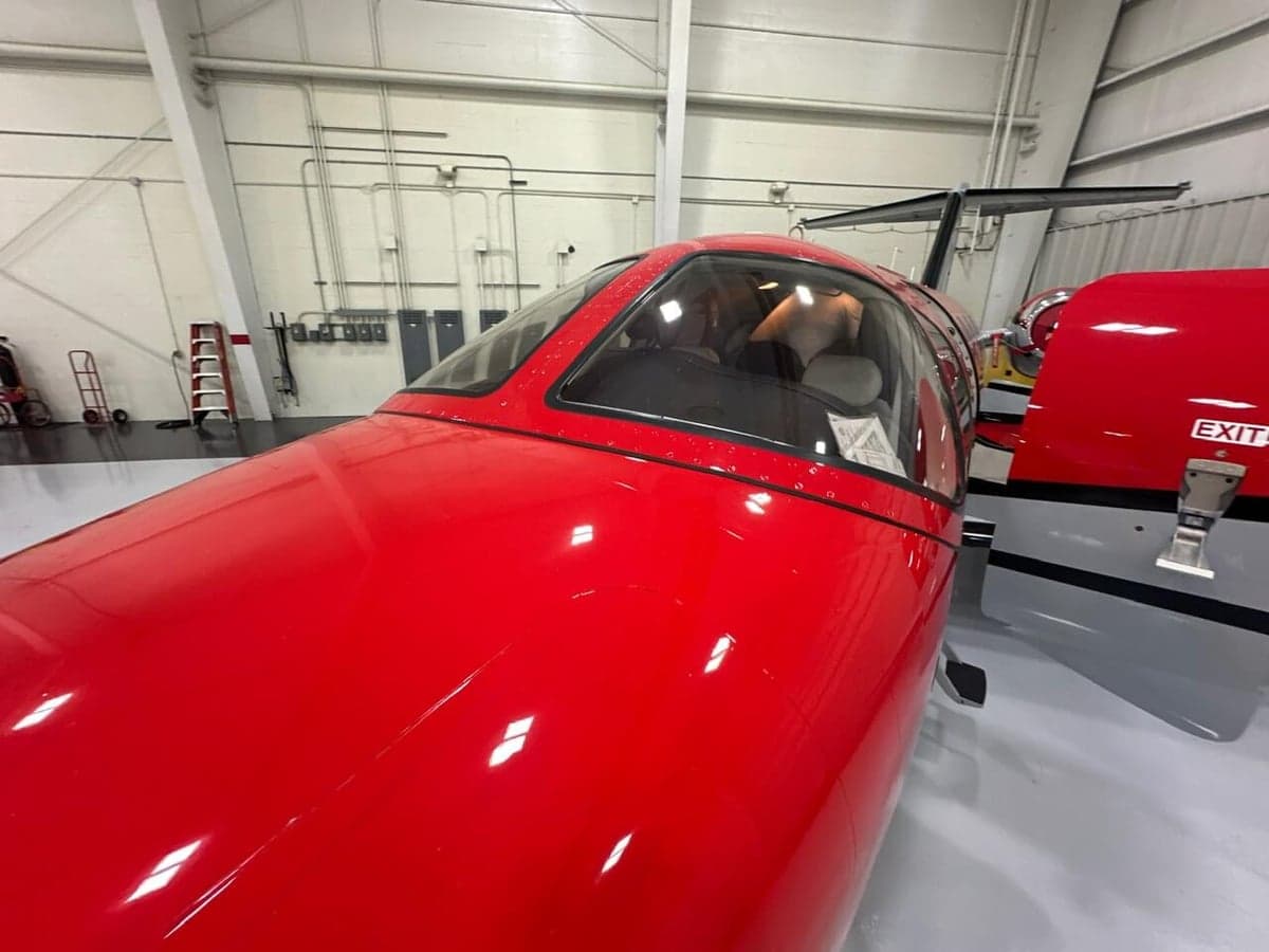 View of the aircraft's cockpit and front windows.