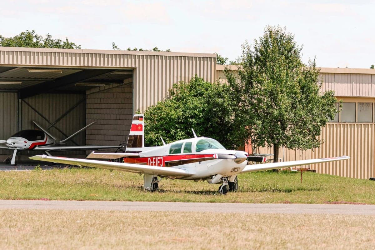 Close up of the tail and fuselage of Mooney M20J aircraft D-EIFJ.
