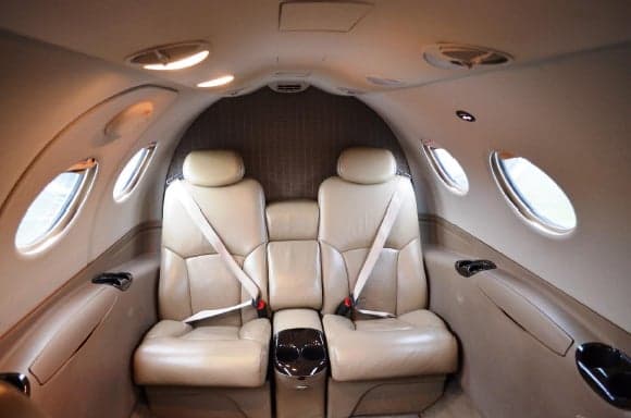 Cabin of the Citation Mustang with two forward-facing seats.
