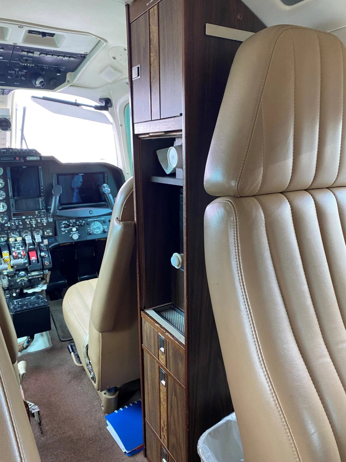 View of the cockpit and cabin seats inside the Mitsubishi MU-300 Diamond.