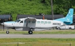 Cessna Caravan with a white and blue paint scheme on the tarmac.
