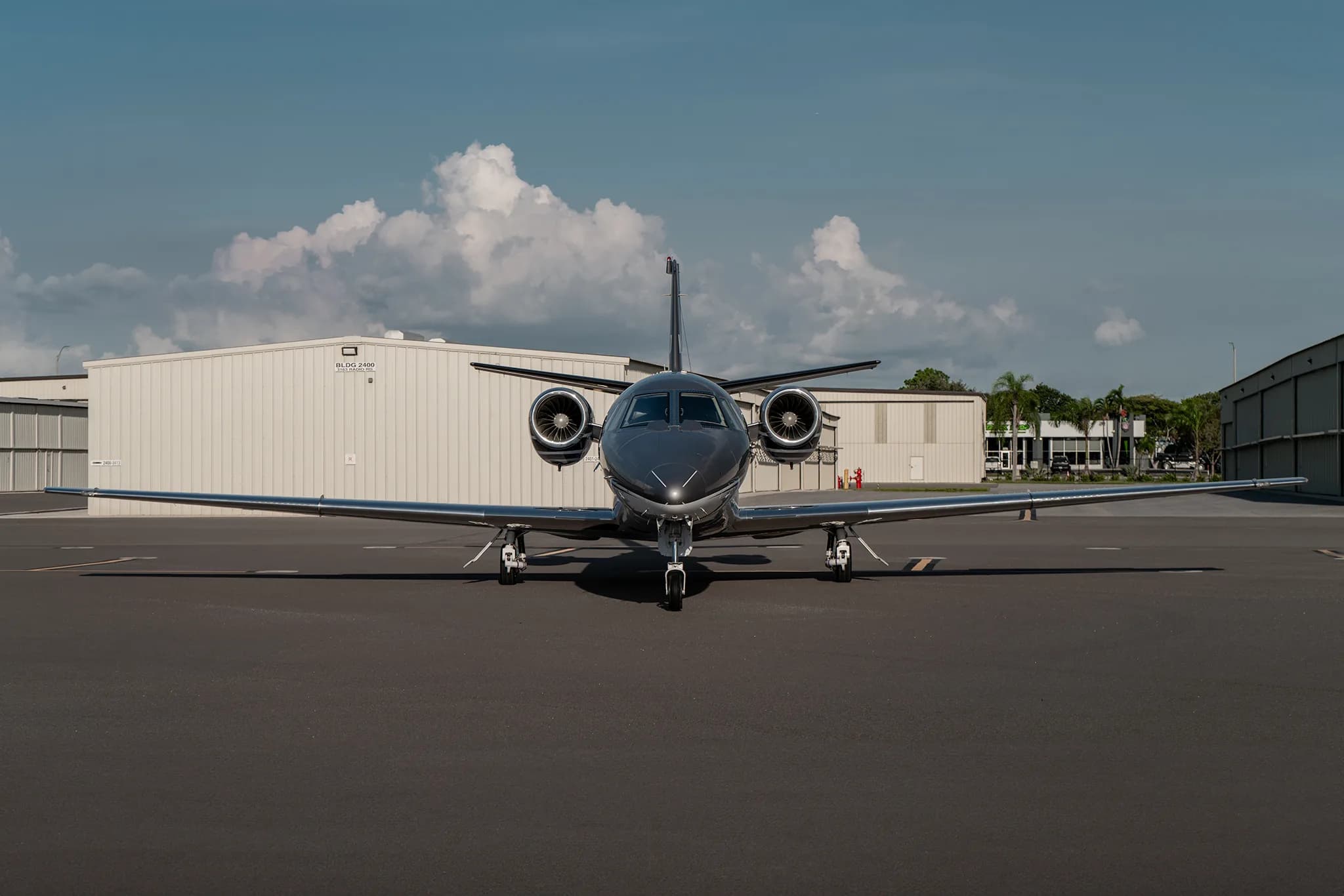 Front view of a Cessna Citation XLS+ aircraft on the tarmac.