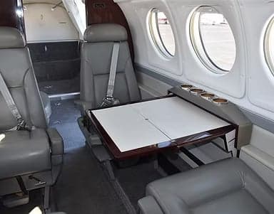 The interior of the aircraft, showing the seating arrangement and cabin features.