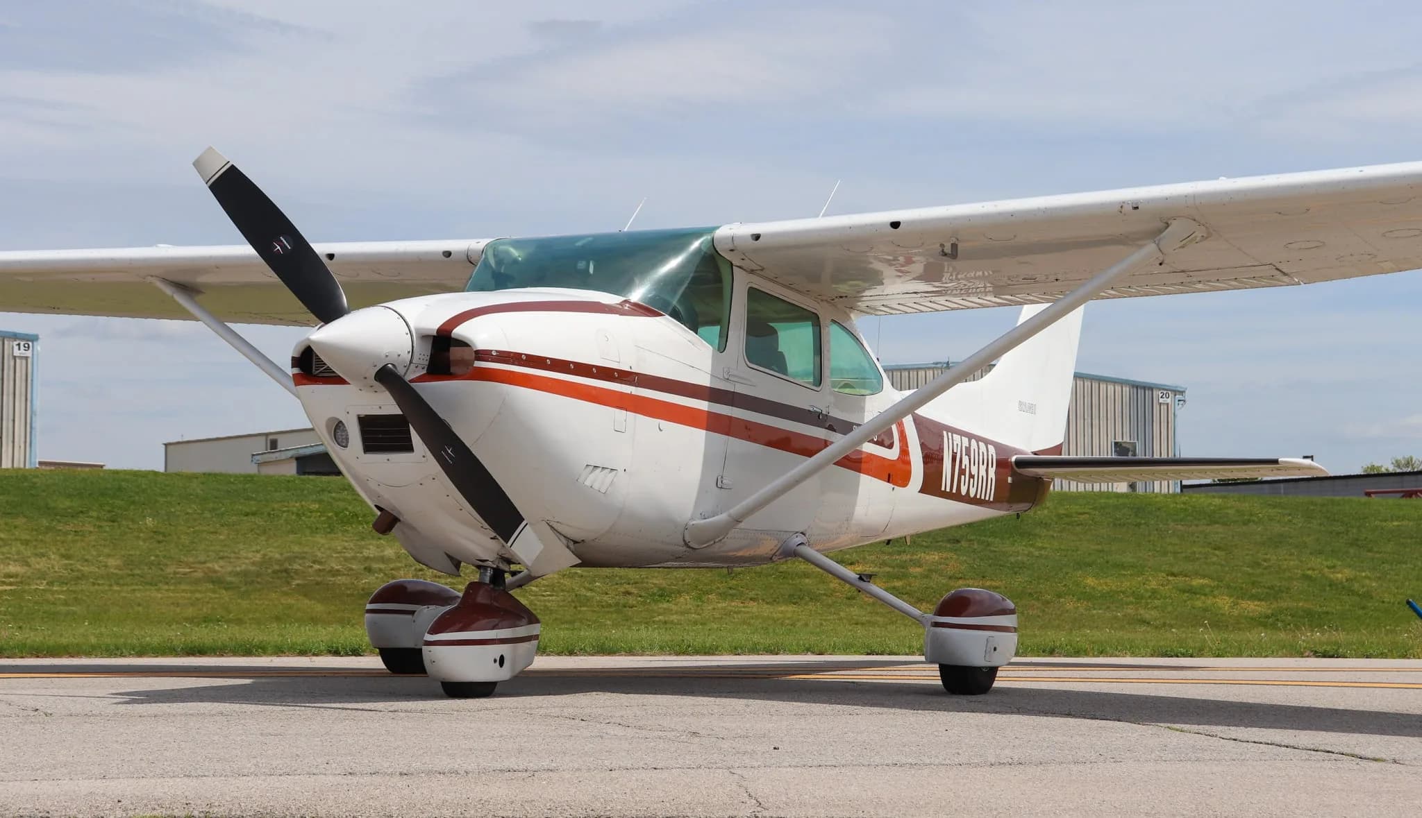 A front-quarter view of the Cessna Skylane S (N759RR) on an airfield.