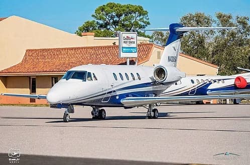 A Cessna Citation CJ3+ aircraft with registration N430SA parked on the tarmac.