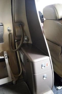 Interior of the Citation Mustang showing a side console and seating.