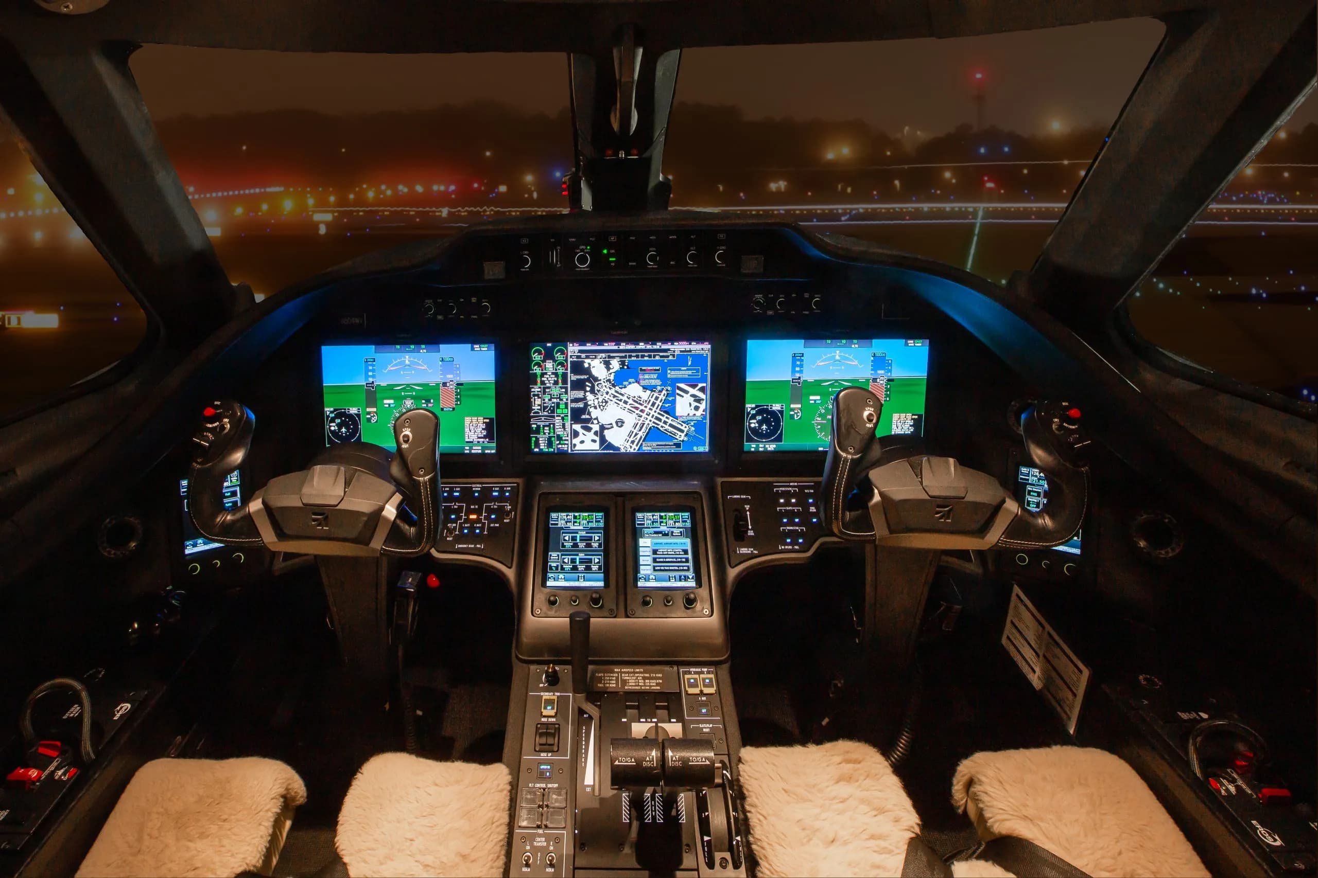 The cockpit of a Citation CJ4 aircraft features advanced avionics and controls.