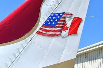 Close up of the aircraft's tail with a flag design.