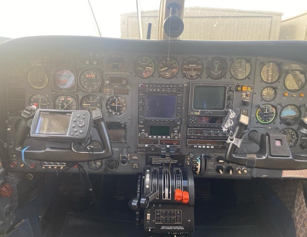 Full view of the aircraft's instrument panel and controls.