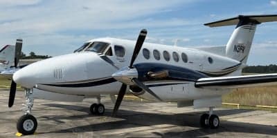 A King Air 350 is parked on the tarmac.
