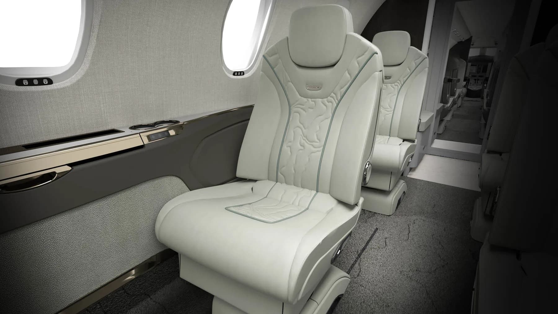Close-up of the aircraft's white leather seats with decorative stitching.