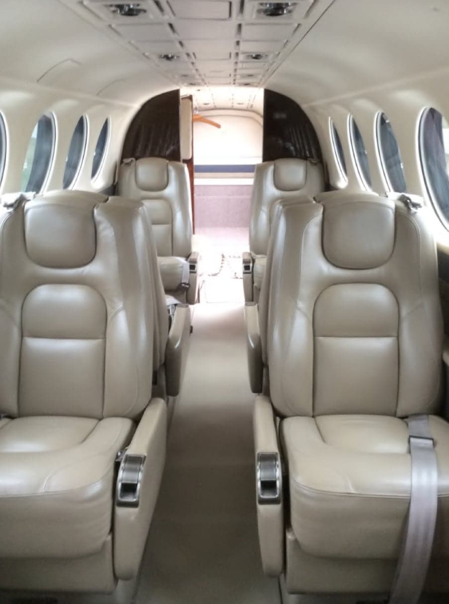 View of the aircraft cabin with leather seats.