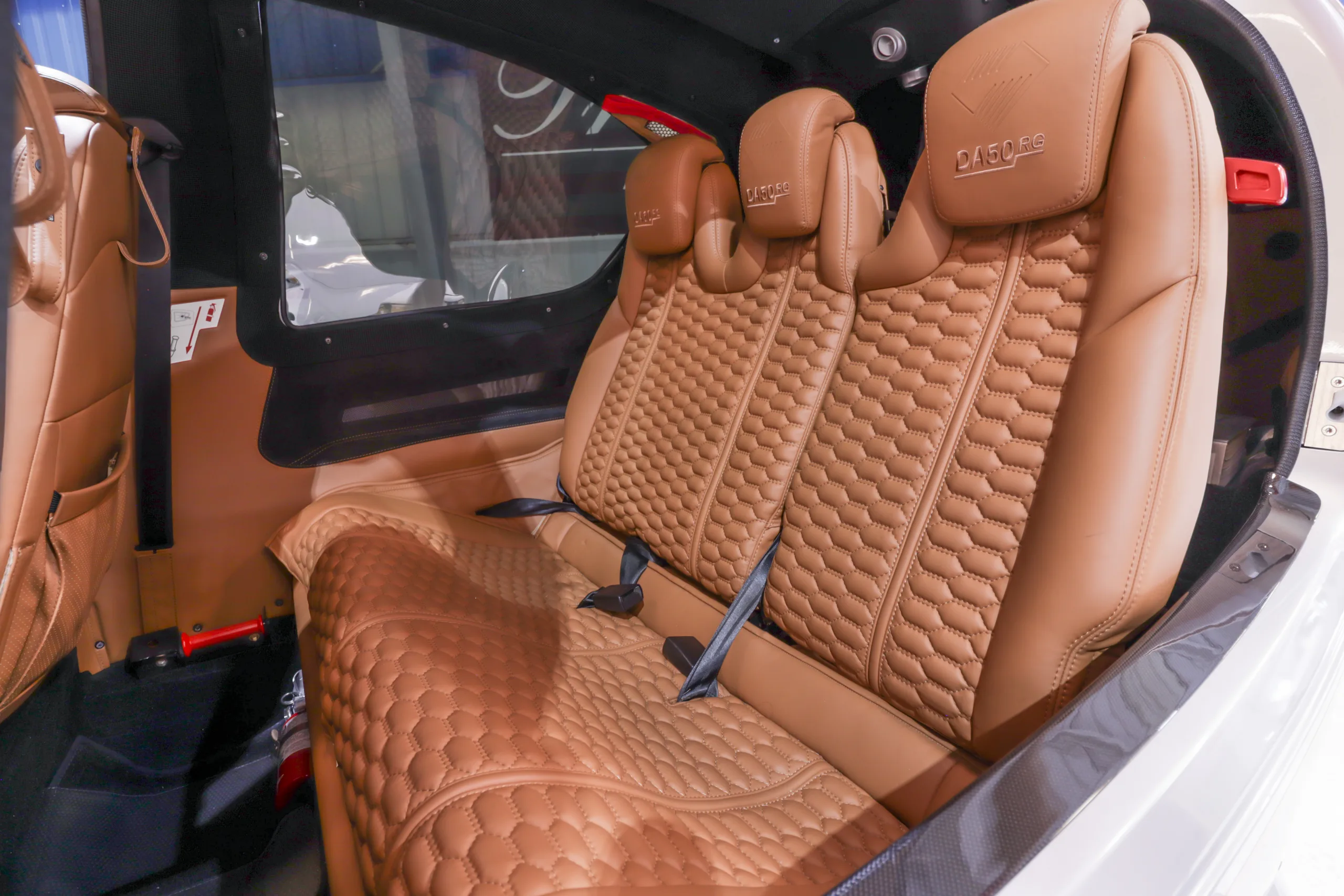 Interior view of the Diamond DA50RG rear cabin seats.