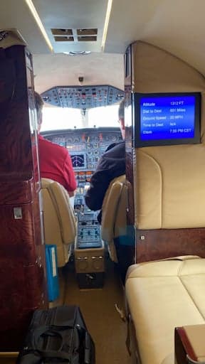 View of the aircraft cabin looking towards the cockpit.