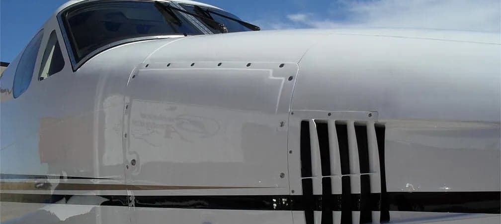 Close up of the fuselage of a King Air aircraft.