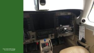 The cockpit of a Piper PA46-350P Mirage, registration SP-NAZ, featuring the instrument panel.