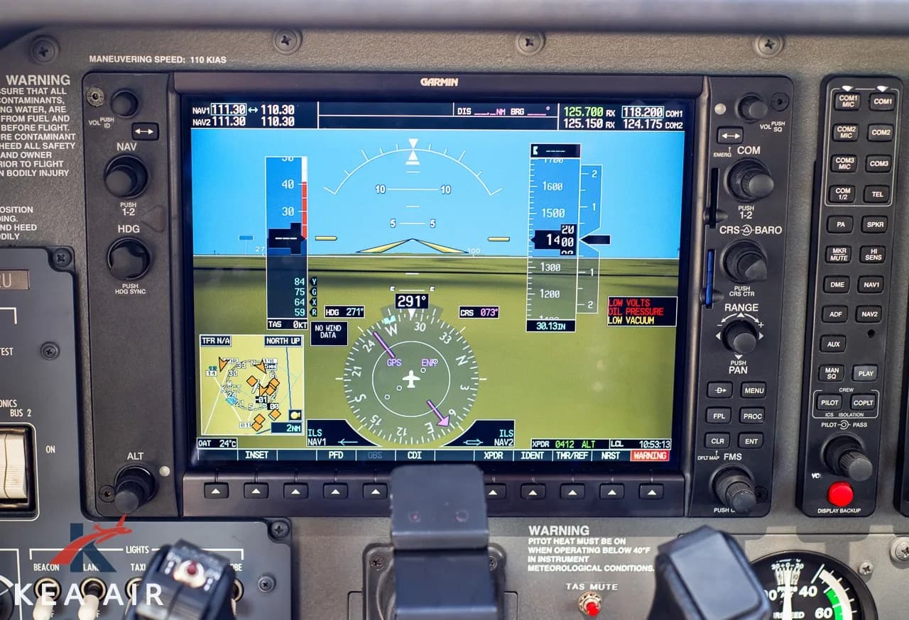 Close-up of the Garmin navigation display showing the aircraft's heading and other flight information.