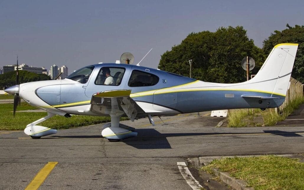 Side view of a Cirrus SR22T on the ground.