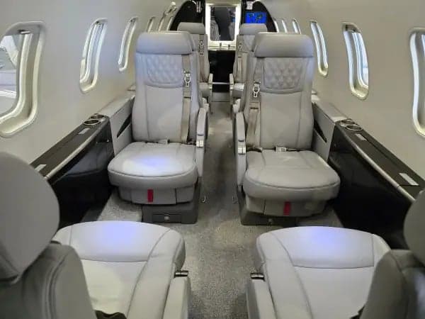 View of the cockpit and a cabinet inside the aircraft.