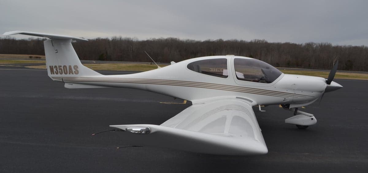 Diamond DA40 aircraft with registration N350AS on the tarmac.
