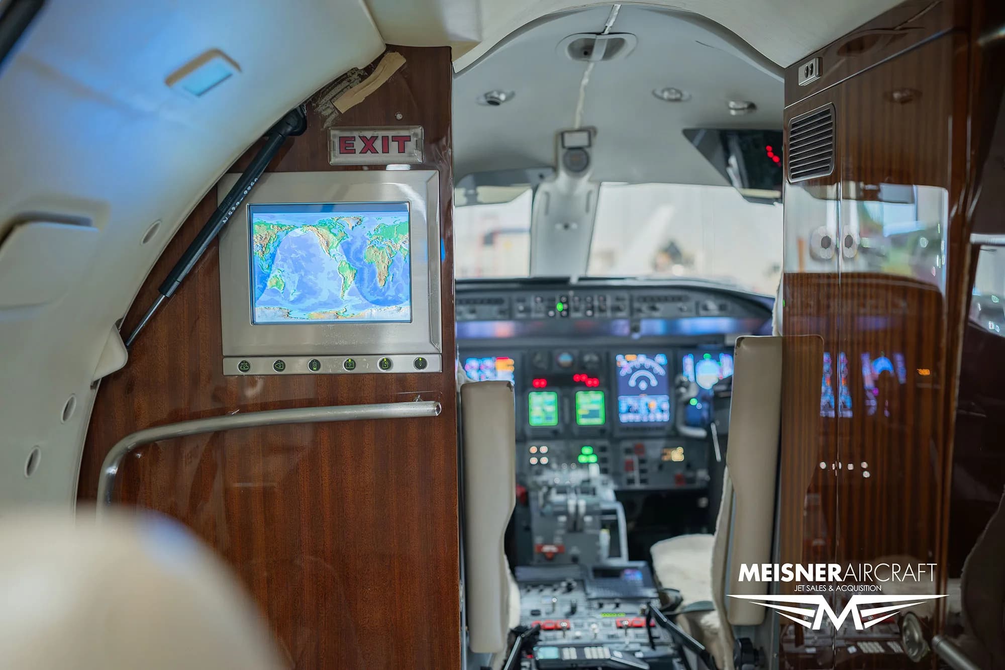 Interior view of the Learjet 45XR cabin looking towards the cockpit.