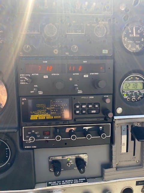 Close-up of the avionics stack in the cockpit of a Cessna 177 Cardinal.
