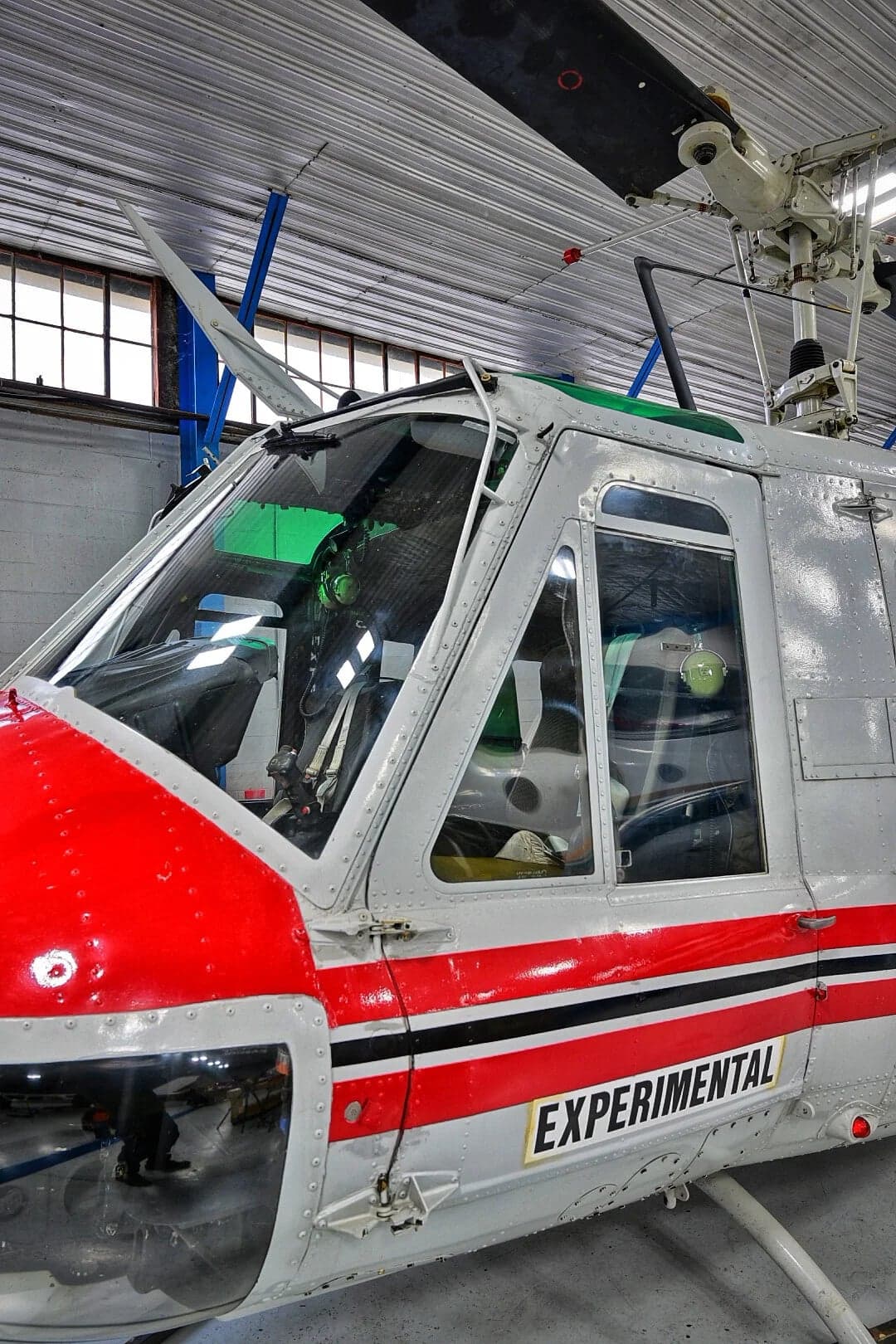 Close-up of the cockpit area of the N857SD helicopter.