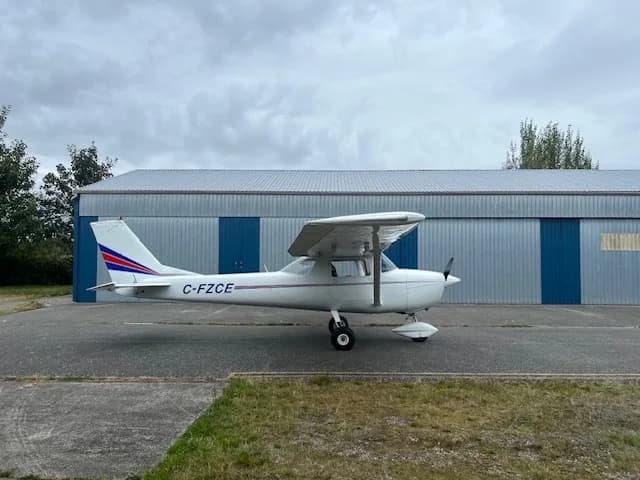 Side view of the C-FZCE Cessna aircraft parked on the tarmac.