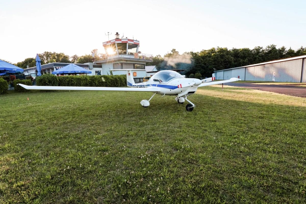 Rear view of a Diamond DA20 Katana D-EMFH parked on grass.