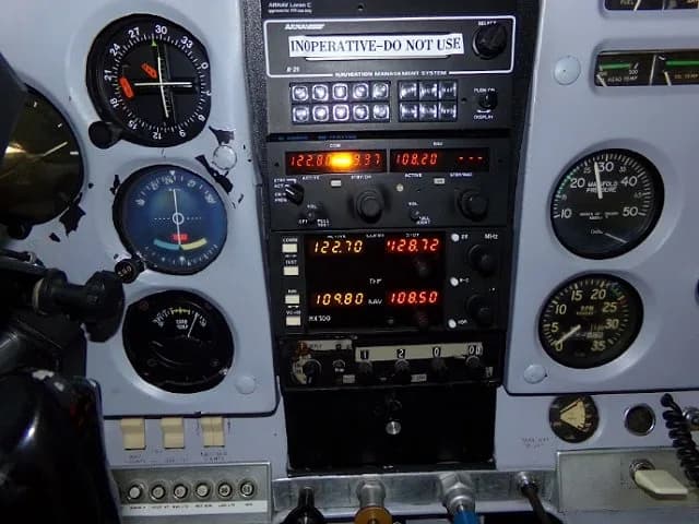 A close-up view of the avionics stack and instruments on the right side of a Cessna 182 cockpit.