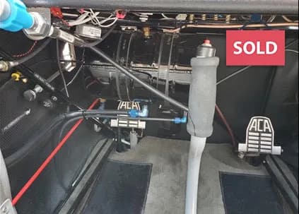Close-up of the aircraft's cockpit controls and pedals.